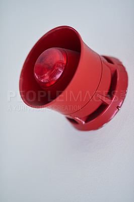 Buy stock photo Emergency, siren and red speaker for fire alarm, warning and evacuation with safety regulations or compliance. Light on wall for security alert, noise and danger with sound, electricity and risk