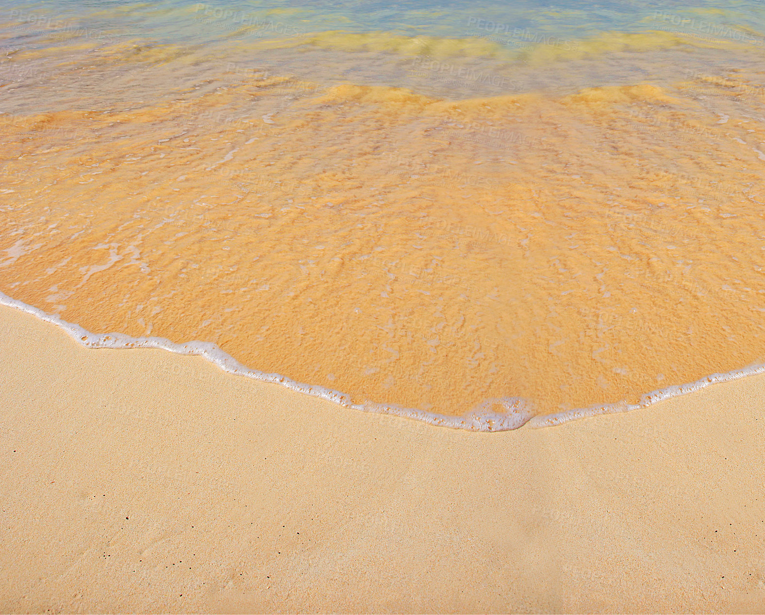 Buy stock photo An ocean with soft waves on a sandy beach with copy space. Beautiful clean sand on the coast, summer nature background and outdoor daylight. The ocean current creating high and low tides on the shore