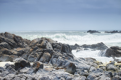 Buy stock photo Holiday, waves and rock with beach and ocean for environment, travel destination and tropical. Summer vacation, water and nature with sea horizon for mediterranean coastline, natural and paradise