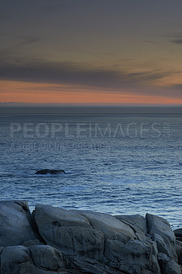 Buy stock photo Nature, sunset and rock with beach and ocean for environment, travel destination and tropical. Summer vacation, water and landscape with sea horizon for mediterranean coastline, holiday and paradise