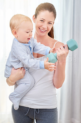 Buy stock photo Mother, baby and workout with dumbell for strong bond, learning and development with time management. Mom, child and home for motor skills or health with smile, exercise or training with weight