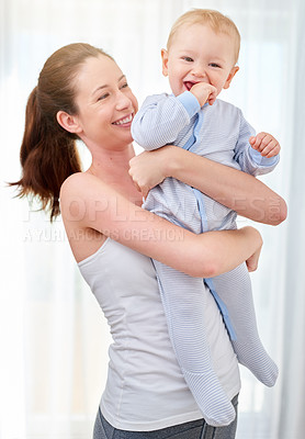 Buy stock photo Mother, baby and arms with smile in portrait for bond, learning and development with time management. Mom, child and together in house for motor skills or wellness, happiness in home or living room