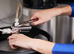 Skilled hands working on your water heating system