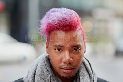 Buy stock photo Portrait of a young man with a funky hairstyle posing outdoors