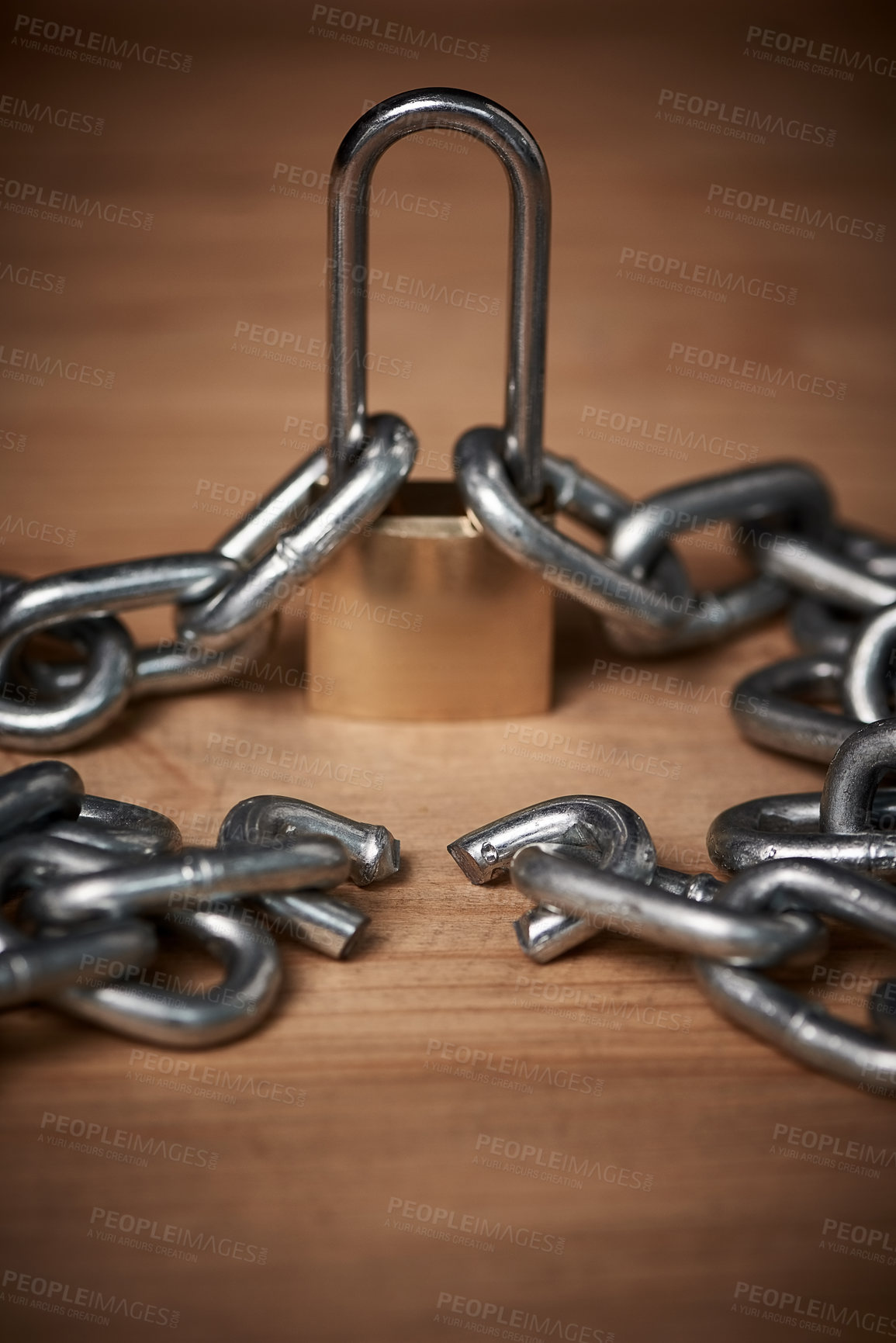 Buy stock photo Shot of a broken metal chain tied to a lock