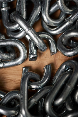 Buy stock photo Shot of metal chains with a broken link