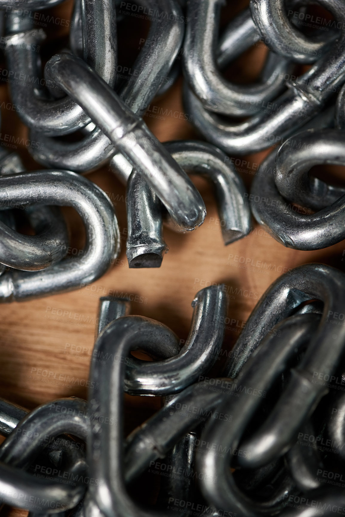 Buy stock photo Shot of metal chains with a broken link