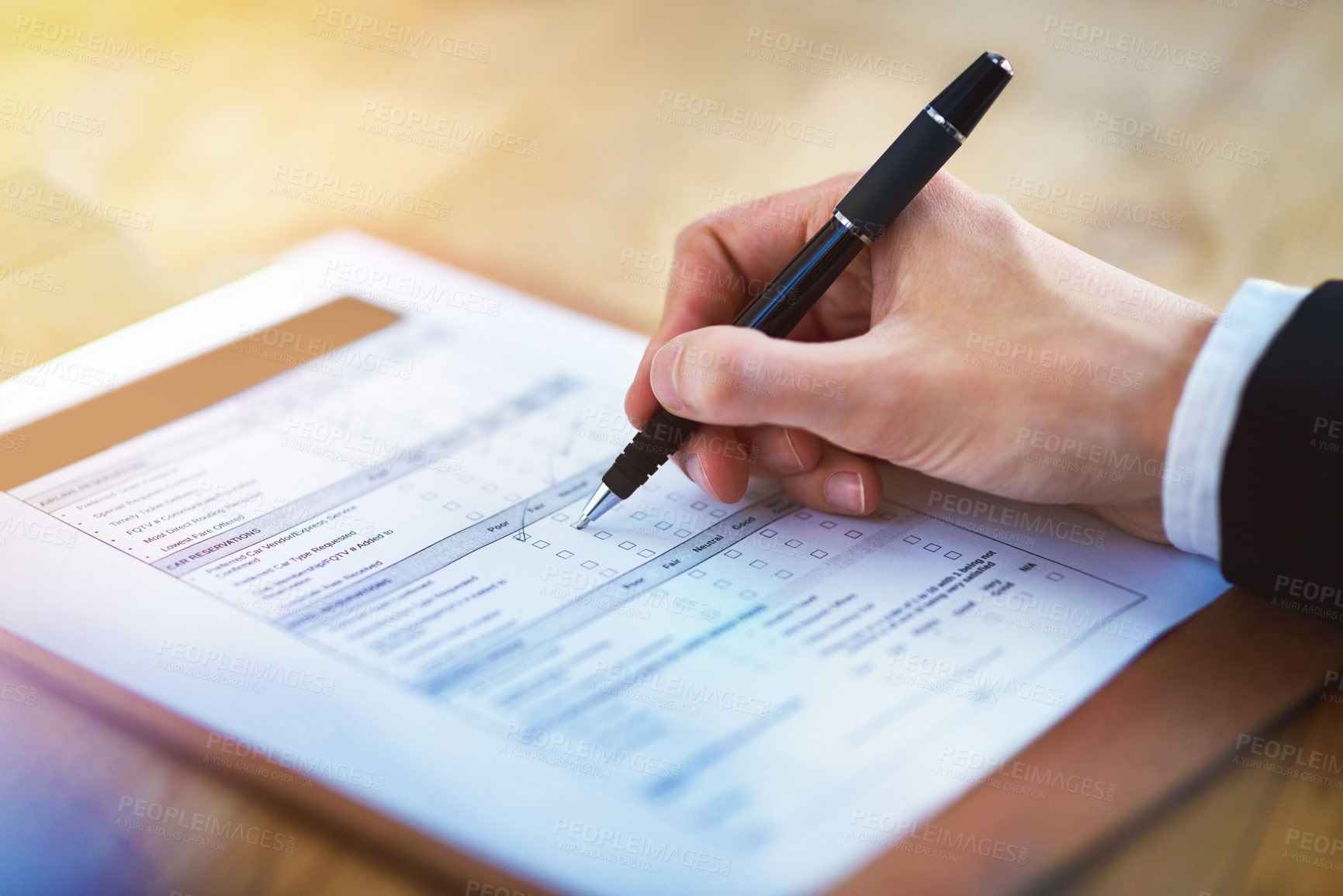 Buy stock photo Cropped shot of a person filling in a form