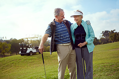 Buy stock photo Golf, hug and smile with senior couple outdoor on course together for leisure activity. Embracing, love and retirement with happy old people playing sports for bonding or recreation in summer