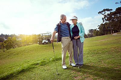 Buy stock photo Golf, love and retirement with senior couple outdoor on course together for leisure activity. Grass, hobby and mockup space with old people playing sports for bonding or recreation in summer