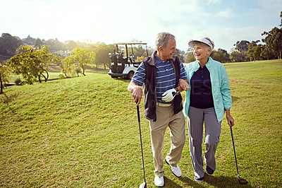 Buy stock photo Golf, smile and walking with senior couple outdoor on course together for leisure activity. Grass, mockup space and retirement with happy old people playing sports for bonding or recreation in summer