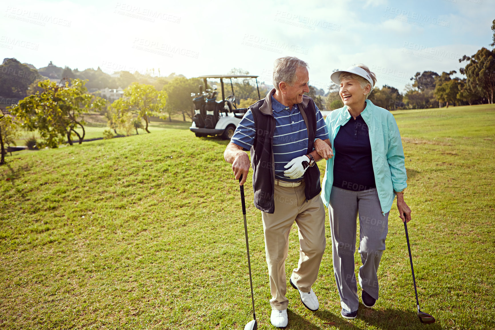 Buy stock photo Golf, smile and walking with senior couple outdoor on course together for leisure activity. Grass, mockup space and retirement with happy old people playing sports for bonding or recreation in summer