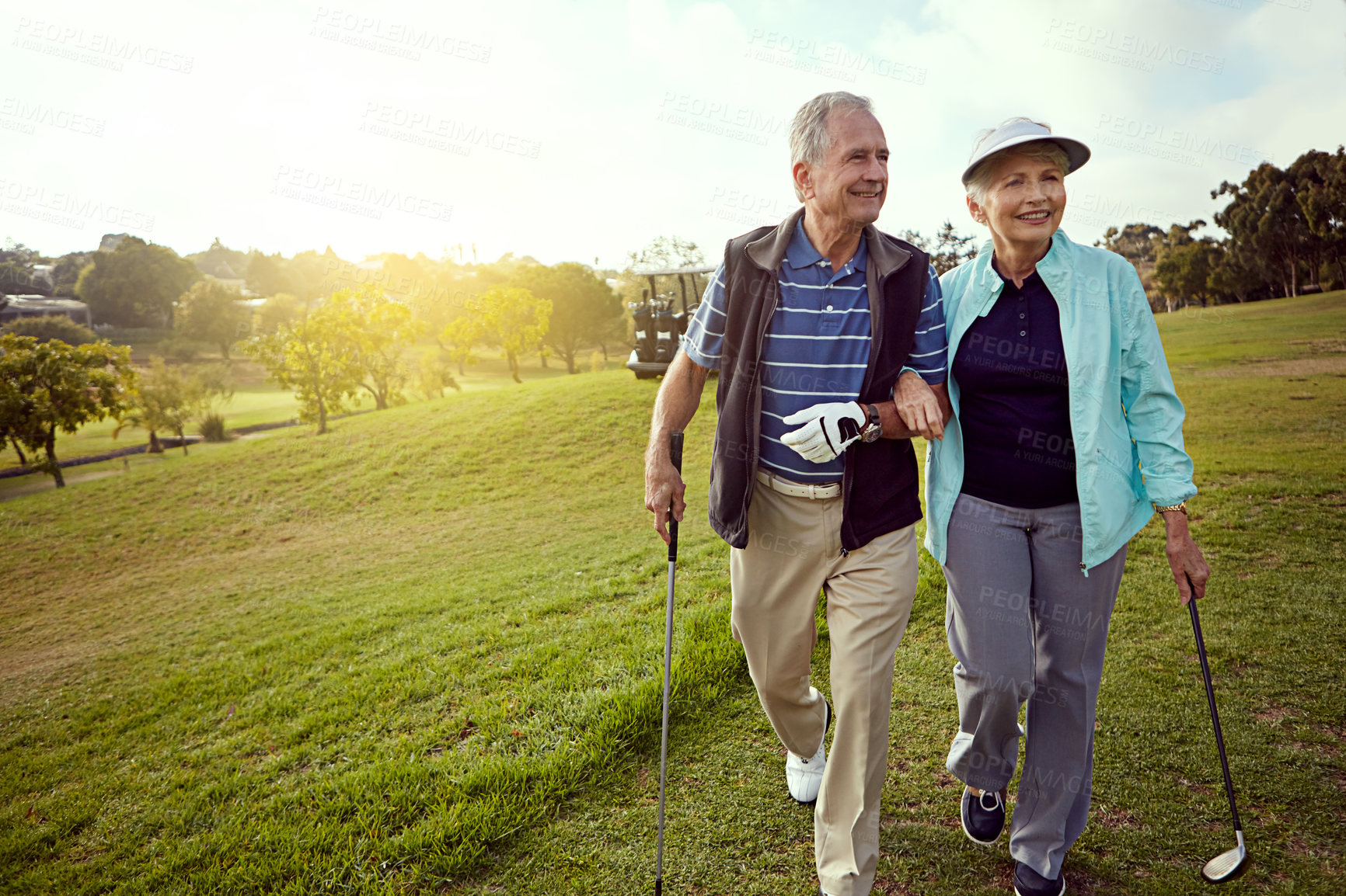 Buy stock photo Golf, retirement and thinking with senior couple outdoor on course together for leisure activity. Mockup space, smile and walking with old people playing sports for bonding or recreation in summer