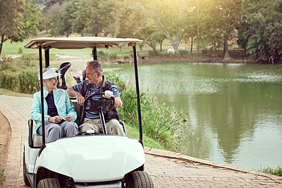 Buy stock photo Couple, happy and golf cart for sports, game and recreation with weekend hobby, bonding and fitness. Senior people, love and smile on course for exercise, practice and club competition with leisure