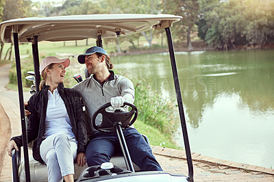 Buy stock photo Couple, hobby and golf cart for sports, exercise and recreation with weekend fun, bonding and fitness. People, driving and smile on course for support, practice game and club competition with leisure