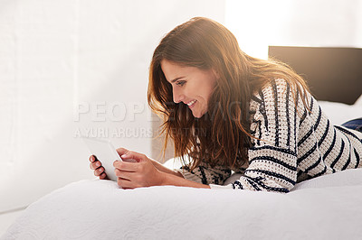 Buy stock photo Smile, search and tablet with woman on bed for social media, communication and digital. Internet, technology and website with female person reading online at home for ebook, streaming and happiness