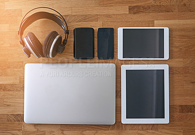 Buy stock photo Shot of digital devices on a table