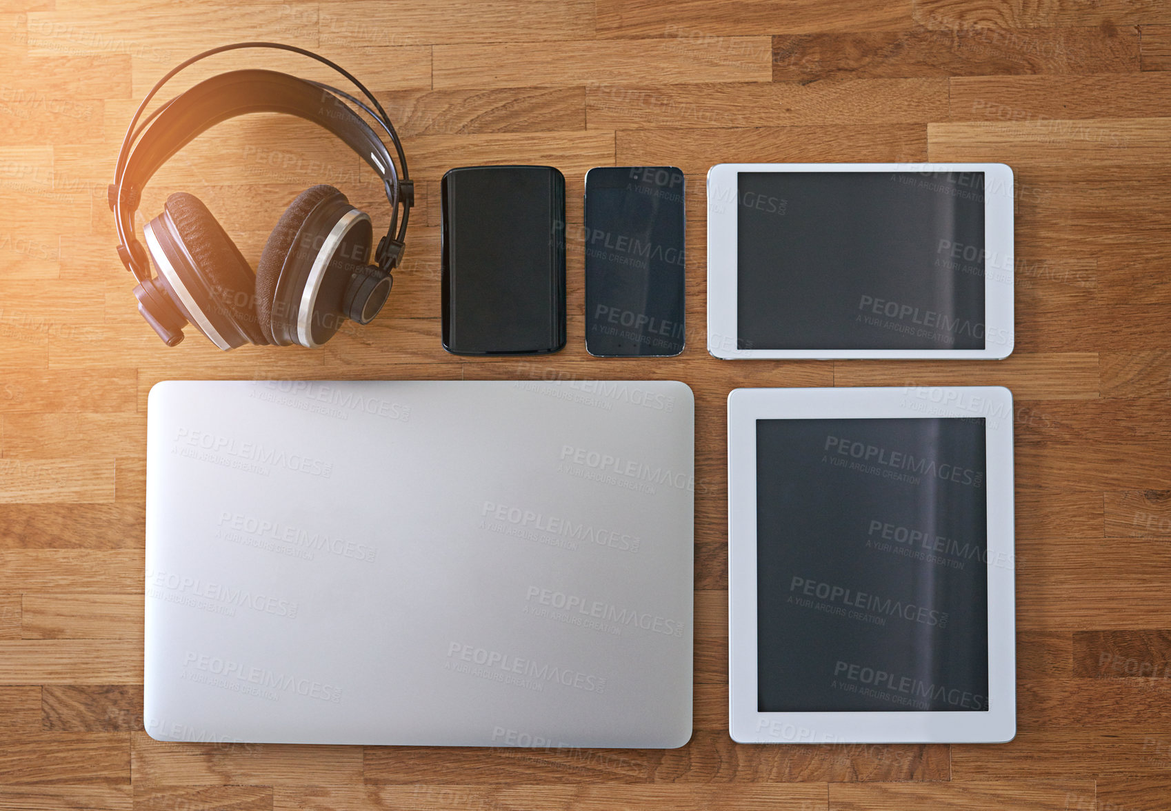 Buy stock photo Shot of digital devices on a table
