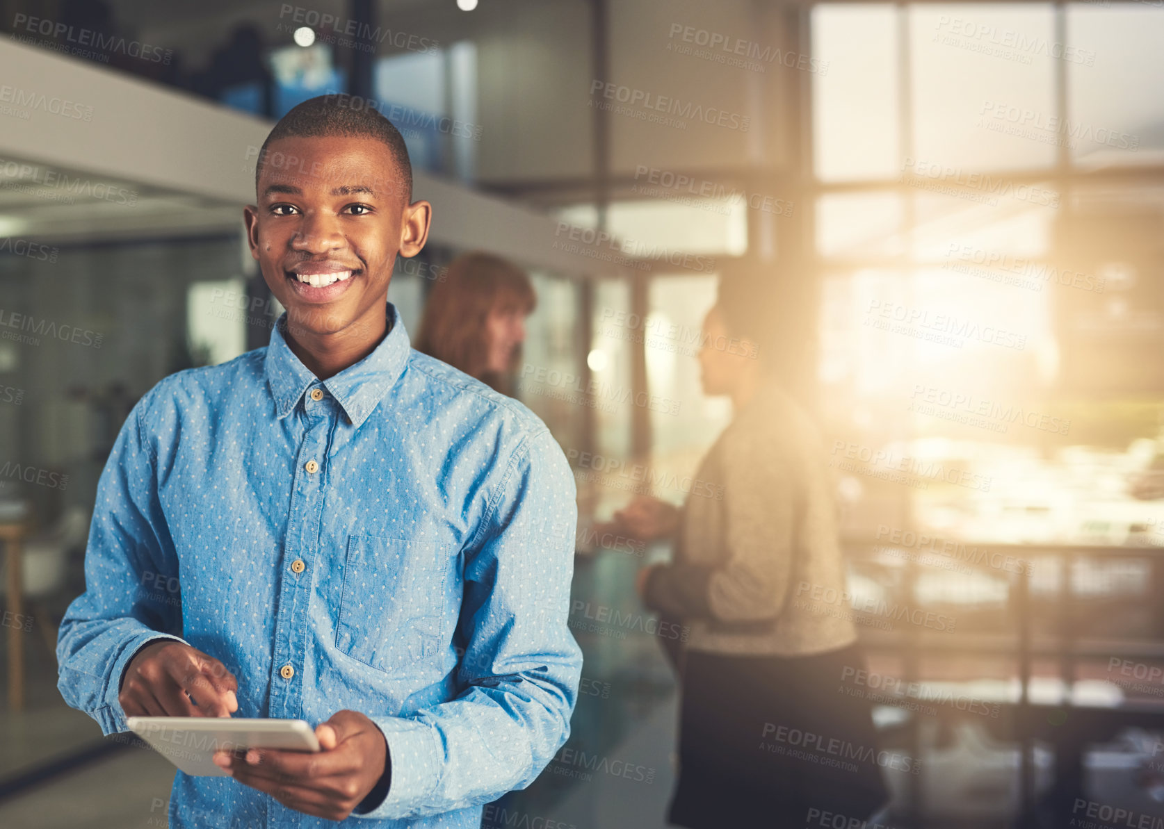 Buy stock photo Cropped shot of a businessman using his digital tablet