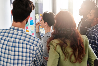 Buy stock photo Cropped shot of a businesswoman giving a presentation to her colleagues in an office