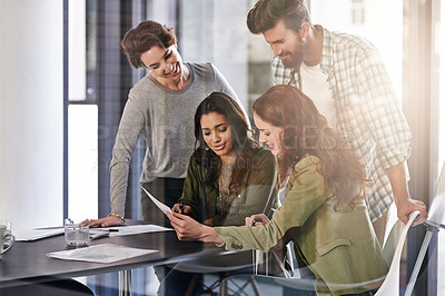 Buy stock photo Shot of a group of colleagues having an office meeting