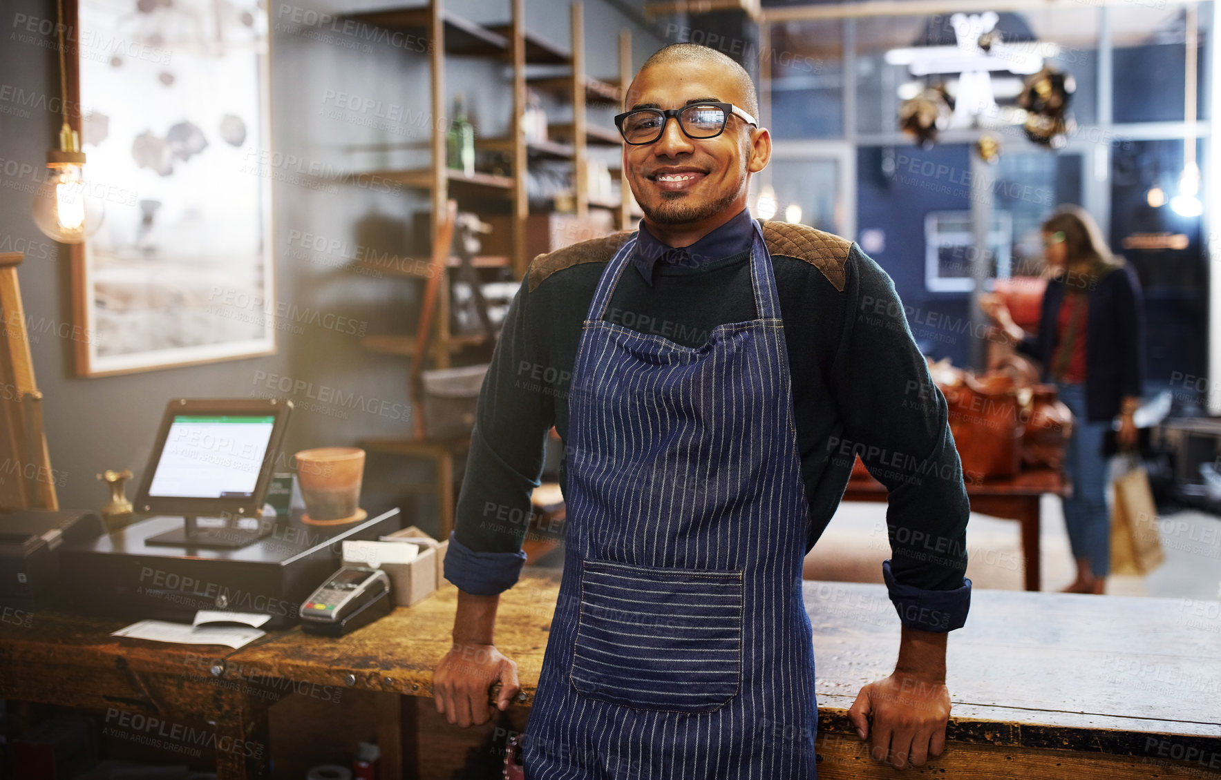 Buy stock photo Portrait of a young entrepreneur standing in his business