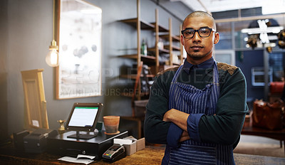 Buy stock photo Portrait of a young entrepreneur standing in his business
