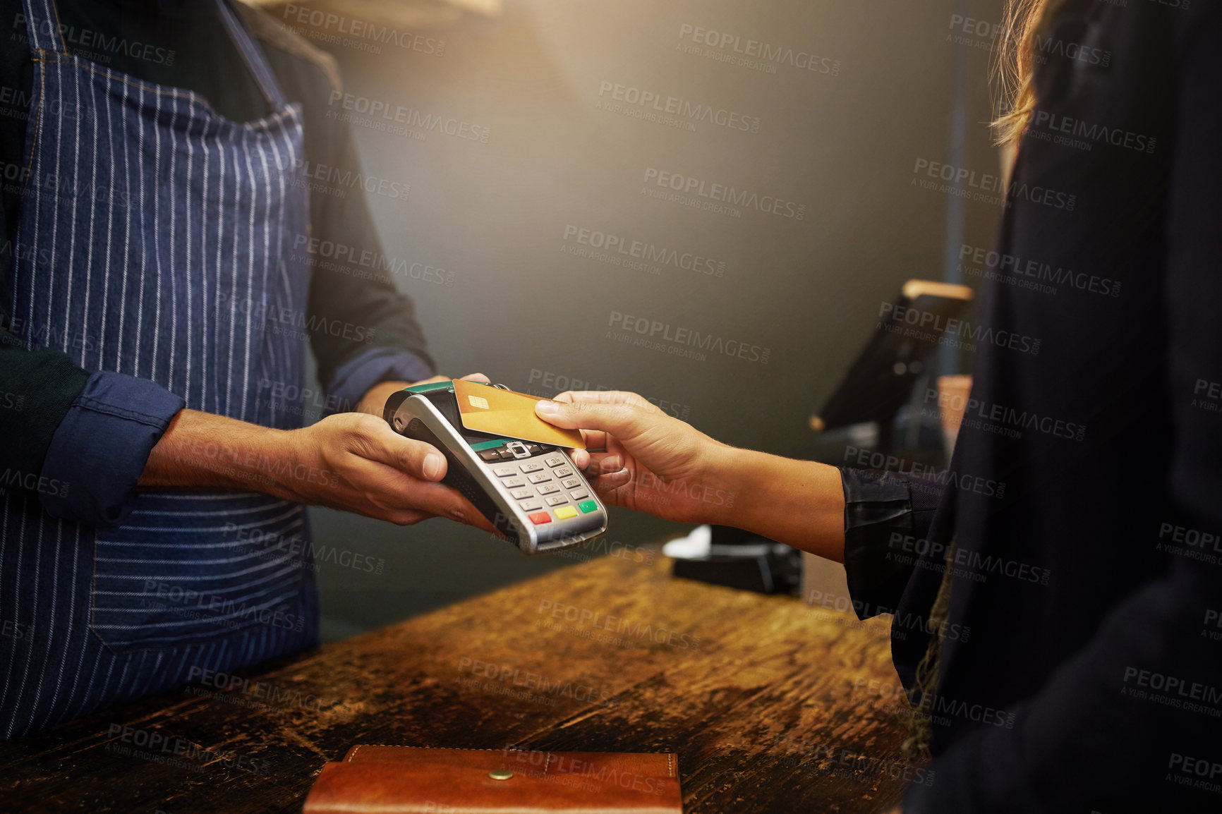 Buy stock photo Woman, credit card and hand of customer for nfc payment, leather store and cashier for transaction. People, commercial sale and electronic machine for tap charge, shopping market and transfer process