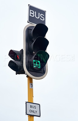 Buy stock photo Traffic light, green and bus at street intersection for caution warning or safety, downtown or city. Sign, transport and driving rules for urban security or road travel, direction or infrastructure