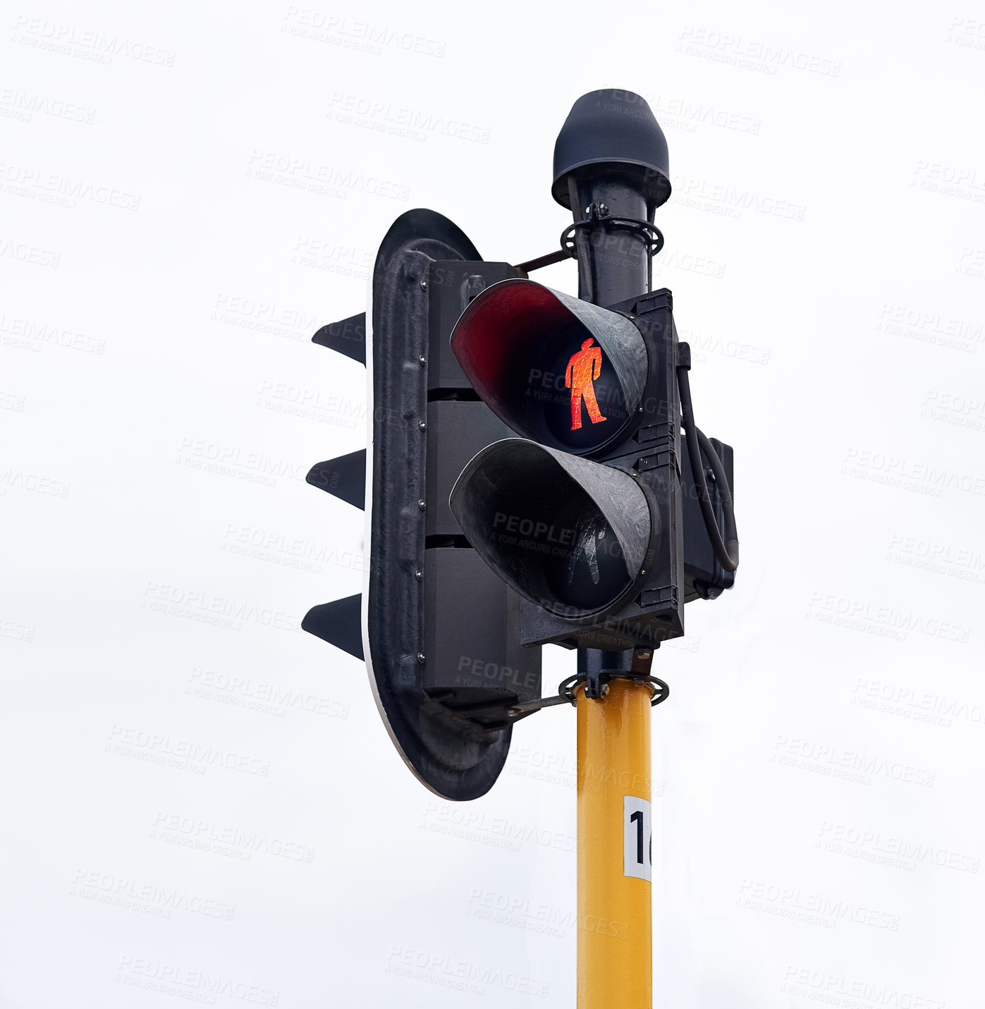 Buy stock photo Shot of traffic lights against a gray sky