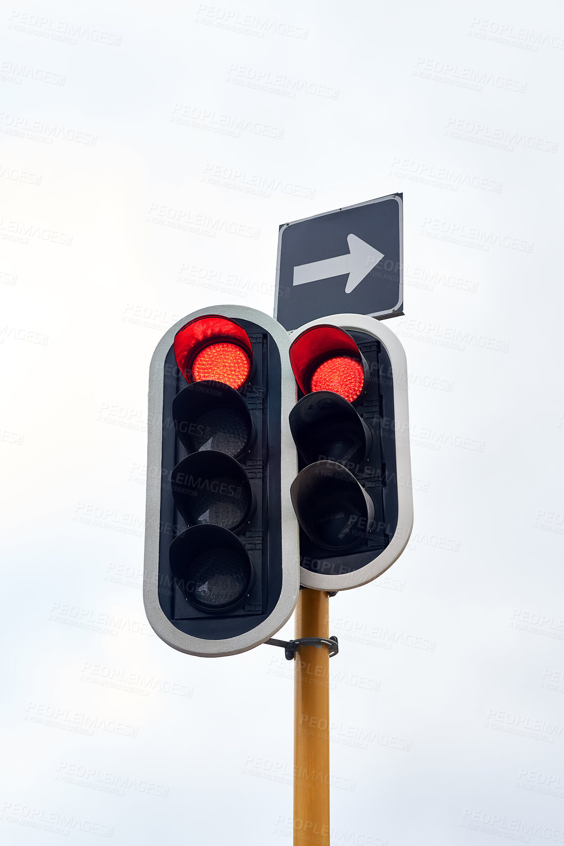 Buy stock photo Traffic light, stop and street rules in city for transport direction or delay, commute or safety. Sign, red and arrow with warning for vehicle driving or urban travel with caution, downtown or road