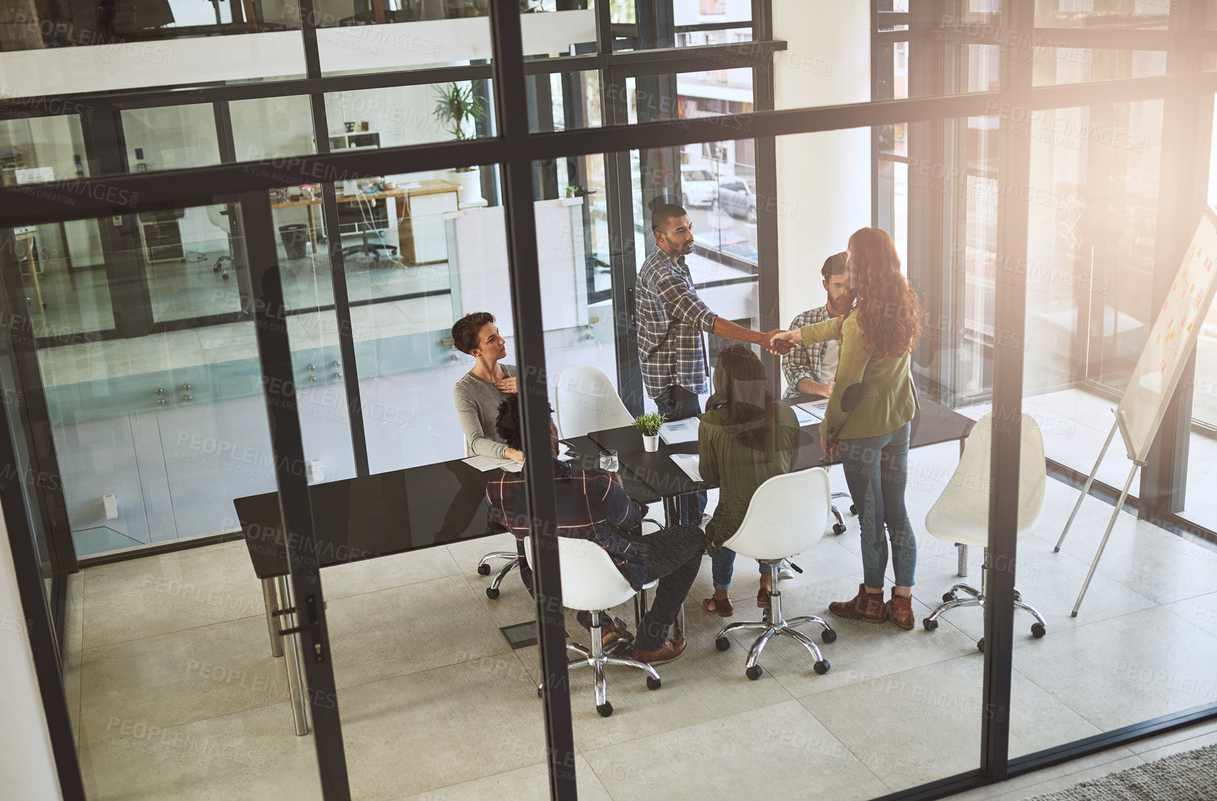 Buy stock photo Employees, shaking hands and introduction in boardroom with client, negotiation and acquisition. Businesspeople, meeting and thanks for presentation at sales agency, onboarding welcome and high angle