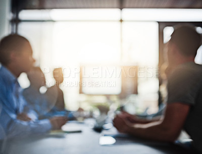 Buy stock photo Cropped shot of businesspeople having a meeting in an office