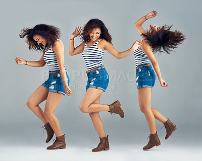Buy stock photo Composite of a carefree young woman posing in studio