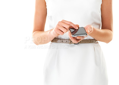 Buy stock photo Cropped shot of s young woman using her cellphone