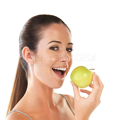 Buy stock photo Portrait, woman and apple with eating in studio for health, awareness and wellness for fruit, diet and nutrition. Female person, food and benefits of organic, fiber and detox as snack in skincare