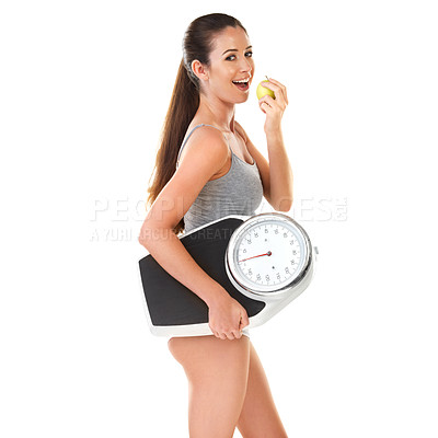 Buy stock photo Woman, weight scale and apple smile in studio on white background for digestion, nutrition and snack. Female person, happy and fruit fresh for organic vegan, food or diet for self care and wellness