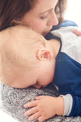 Buy stock photo Mommy, baby and sleeping for hug in home, security and support in bonding for wellness or trust. Mother, toddler and care for maternity or embrace in nap, child development and comfort for single mom