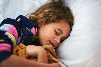 Buy stock photo Cropped shot of a young girl sleeping with soft toys