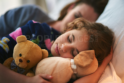Buy stock photo Young girl, mother and sleeping with teddy bear in bed with love and bonding. Kid, mom and dream together in the morning with daughter and mama in a family home feeling relax, calm and rest in house