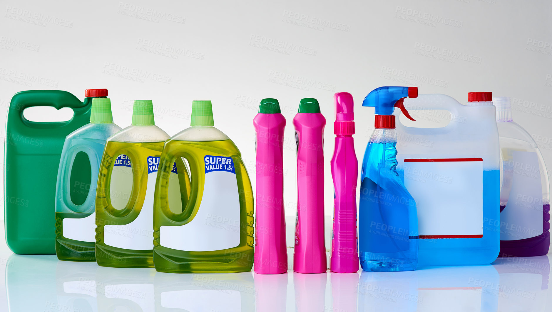 Buy stock photo Studio shot of various bottles of detergents against a grey background