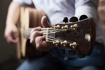 Buy stock photo Hands, home and man with guitar, music and instrument with strings, talent and musician. Learning, closeup and person with audio, producing sound or strumming with creativity, culture and practice