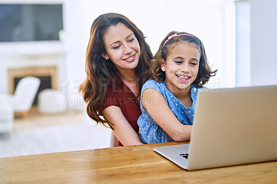 Buy stock photo Happy, mother and young girl with laptop for remote education, learning and child development at home, Excited, mom and kid with computer on table for study, homework and teaching motor skills