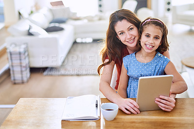 Buy stock photo Mother, girl and tablet in portrait at table, online class and remote learning or education in home. Daughter, mama and streaming cartoon or app for development, bonding and support in childhood