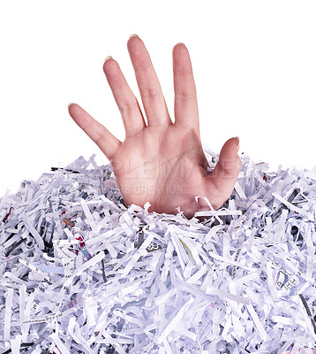 Buy stock photo Studio shot of a woman's hand reaching out from under a pile of shredded paper against a white background