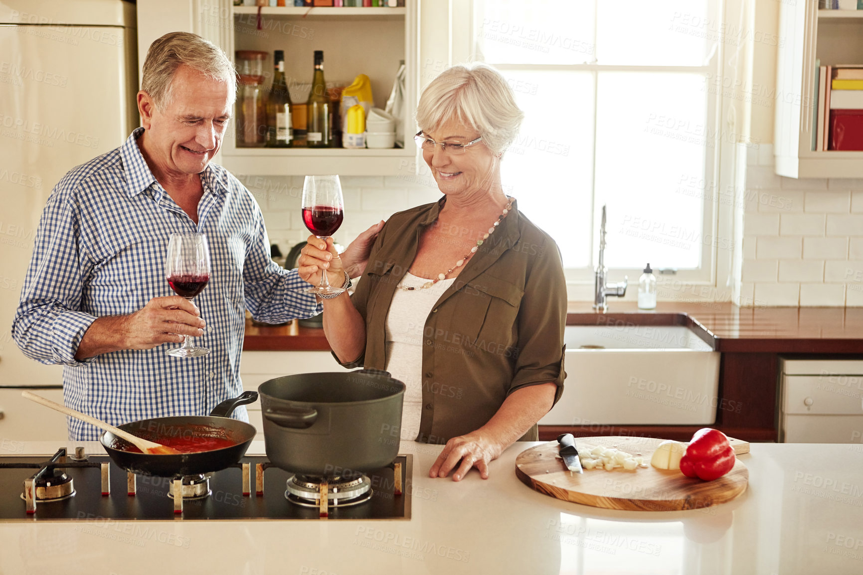 Buy stock photo Toast, wine or old couple cooking food for a healthy vegan diet together with love in retirement at home. Happy, cheers or senior woman drinking in house kitchen to celebrate with husband at dinner