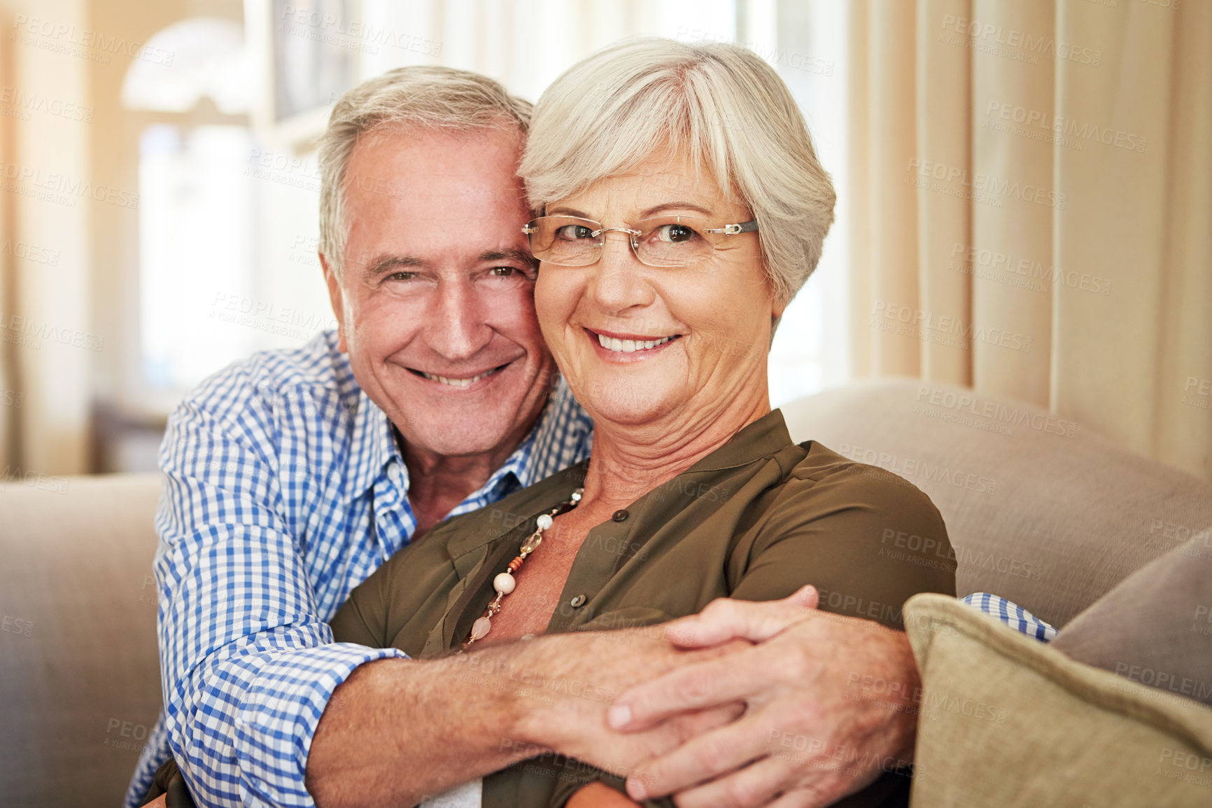 Buy stock photo Cropped portrait of a senior couple at home