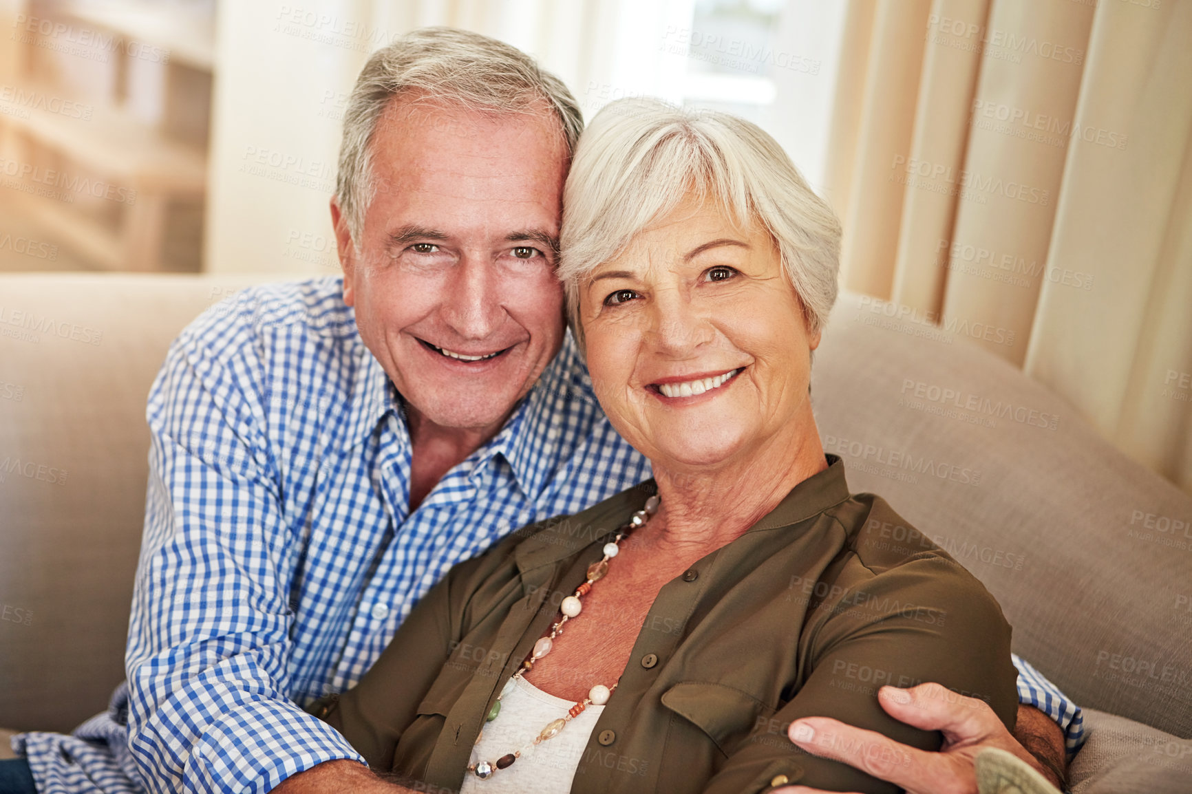 Buy stock photo Cropped portrait of a senior couple at home