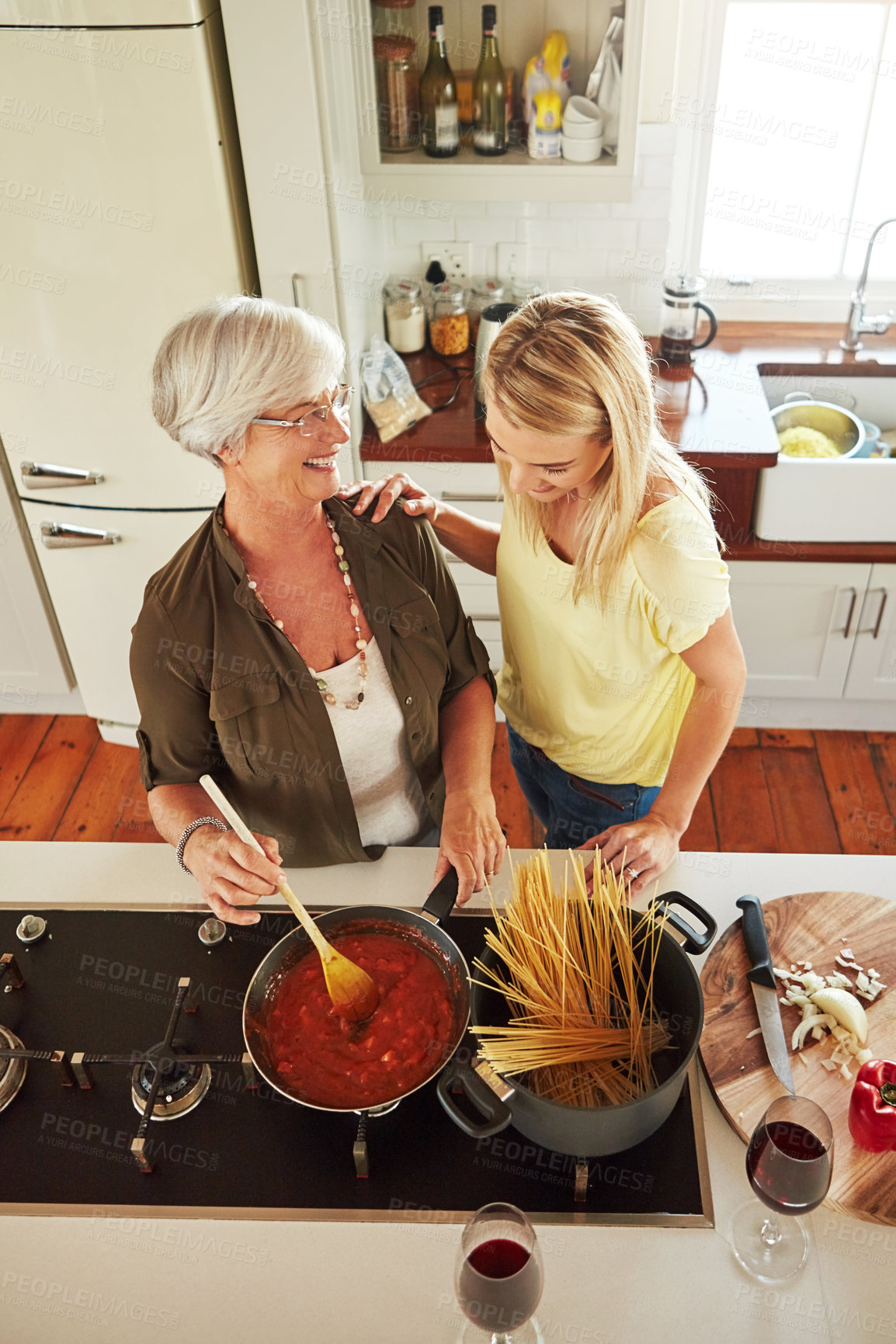 Buy stock photo Teaching, woman or happy mother cooking food for a healthy diet together with love in family home. Funny, above or adult child learning or helping senior mom in house kitchen for lunch meal or dinner