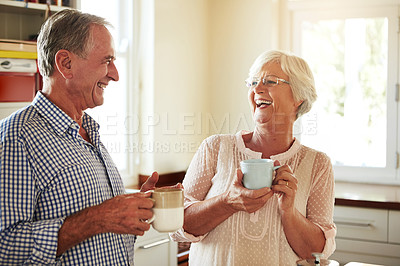 Buy stock photo Funny, coffee or old couple laughing in kitchen at home bonding or enjoying quality time together. Happy retirement, morning or senior man talking, relaxing or drinking tea espresso with mature woman